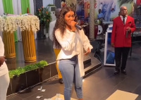 Wendy Shay singing in the chapel of Prophet Akwesi Appiah