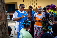 File photo: A healthcare personnel educating some teenagers