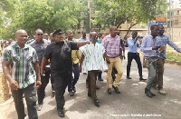 Koku Anyidoho (in all black attire)