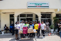 Members of the foundation in a photo with  Dr. Kwame Darko