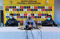 South Africa coach Hugo Broos (middle) at the post-match press conference