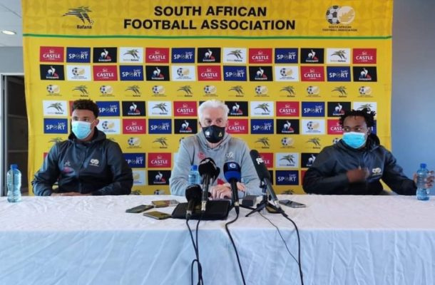 South Africa coach Hugo Broos (middle) at the post-match press conference