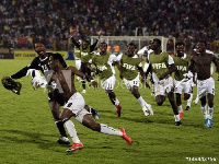 Emmanuel Agyemang-Badu celebrating wining penalty with Black Satellite teammates