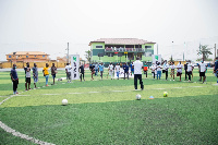 Some of the players in a photo with their instructors