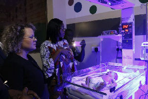 Ambassador Shani Cooper with officials at the Kumasi South Hospital Neonatal Unit