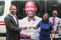 Okoe-Boye handing over the keys of the bus to the management of LEKMA Hospital