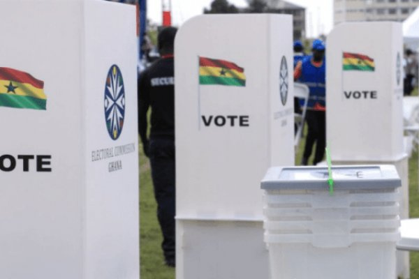 File: An EC official arranges the chairs for voters