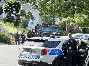 Police deployment outside the scene of the shooting