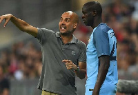 Yaya Toure taking instructions from Guardiola