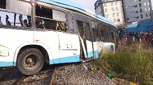 This photo taken on March 9, 2023 shows the scene of a train-bus collision in Lagos, Nigeria