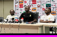 Otto Addo (middle) addresses a press conference in Abuja