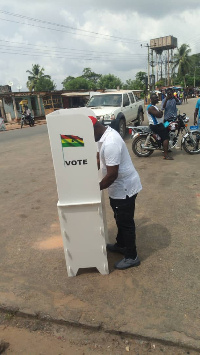 MP for the Ellembelle, Armah Kofi Buah casting his vote