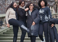 Rita Dominic (middle) and some friends at her wedding