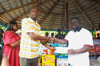 GJA president, Albert Kwabena  Dwumfour donating to some orphanage homes.