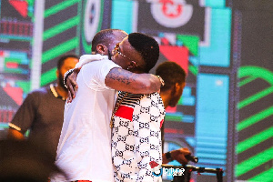 Wizkid and Davido perform at a concert in