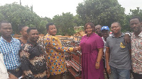 Hon. Adelaide Yaa Agyeiwaa Ntim donating the desks to school authorities