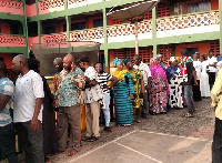 Voters in a queue