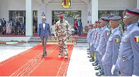 Rwanda’s President Paul Kagame (left) when he met with students at the military academy in Guinea