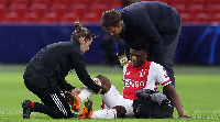 Ghana international Mohammed Kudus seated on the field