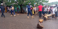 Police men combing the streets of  Lower Manya Krobo