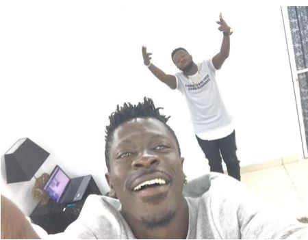 Self-acclaim dancehall king Shatta Wale with Guru