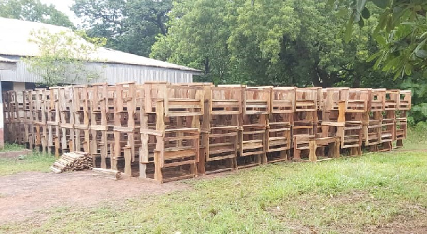 The 300 wooden dual desks presented to the East Gonja Municipal Education Service Directorate