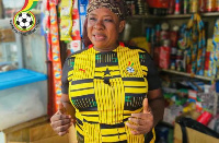 A Ghanaian woman wearing the new Black Stars jersey