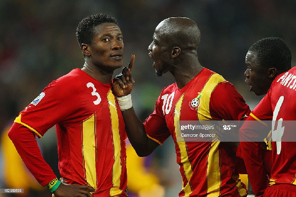 Asamoah Gyan and Stephen Appiah