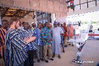 Dr Mahamudu Bawumia interacting with works at the third medical drone delivery service at Kukua