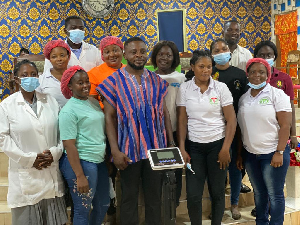 Charles Oteng with some of the beneficiaries