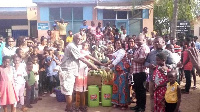 Officials of the Assembly present the items to the representatives of the PWDs