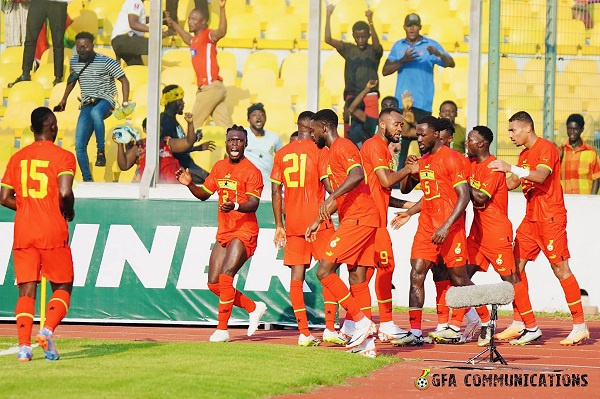 Black Stars players celebrating a goal