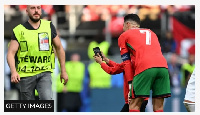 Five people made it on to the pitch to try and take pictures with Cristiano Ronaldo