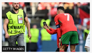 Five People Made It On To The Pitch To Try And Take Pictures With Cristiano Ronaldo