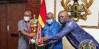 President Nana Addo Dankwa Akufo-Addo and some officials with the president's cup