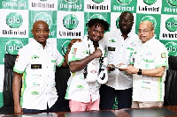 Samir Bastie with GLO officials