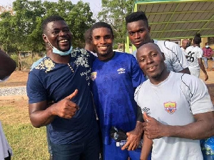 Coach Samuel Boadu with some of the players