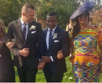 Stephen Kabutey holding hands with his gay partner and being accompanied by his mother.