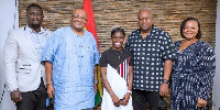 Former President John Dramani Mahama with Martha Bissah and her team