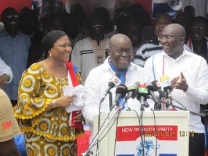 Prsident Nana Akufo-Addo flanked by his wife and running mate during the 2012 campaign