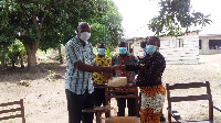 The 2002 Year Batch presenting the donation to the school