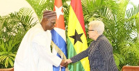 Ambassador Abdulai in a hand shake with Her Excellency Gladys Bejerano Portela