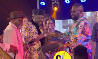 Osebo the Zaraman presenting the slippers to Dr. Osei Kwame Despite