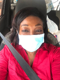 Otiko Afisah Djaba in a nose mask