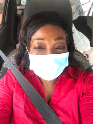 Otiko Afisah Djaba in a nose mask