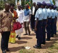 Hon. Della Sowah inspecting the school's Airforce Cadet Corps