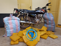 Display of the parcels and the bike used in transporting them