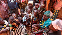 Families who fled their country, wait to be registered as refugees at Nyarugusu camp, Tanzania