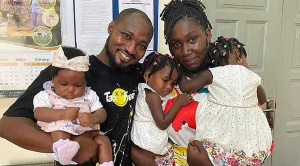 Funny Face in a shot with his baby mama and three children