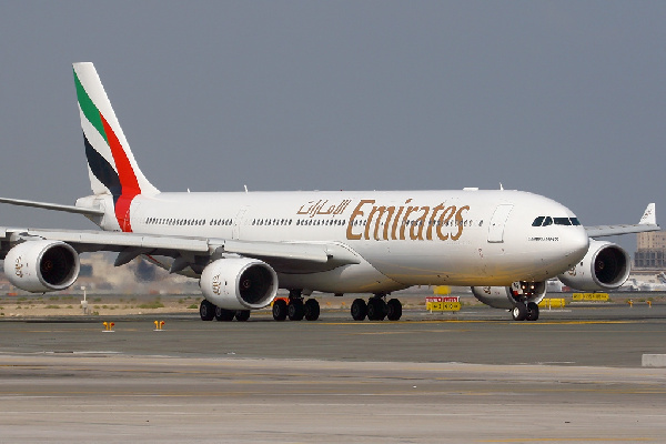 An Emirates plane on a runway - File Photo